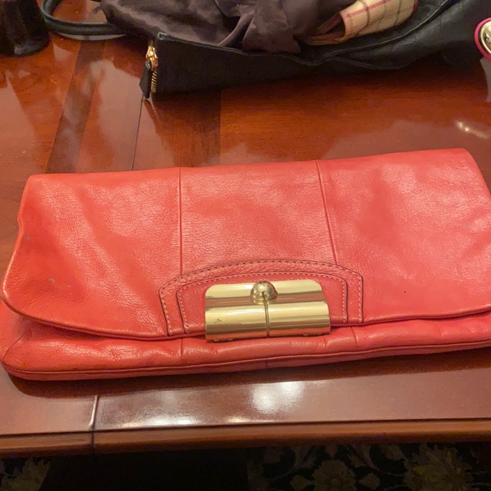 Coach Pink Leather clutch with classic gold clasp